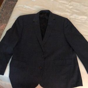 This is a navy plaid-ish sport coat